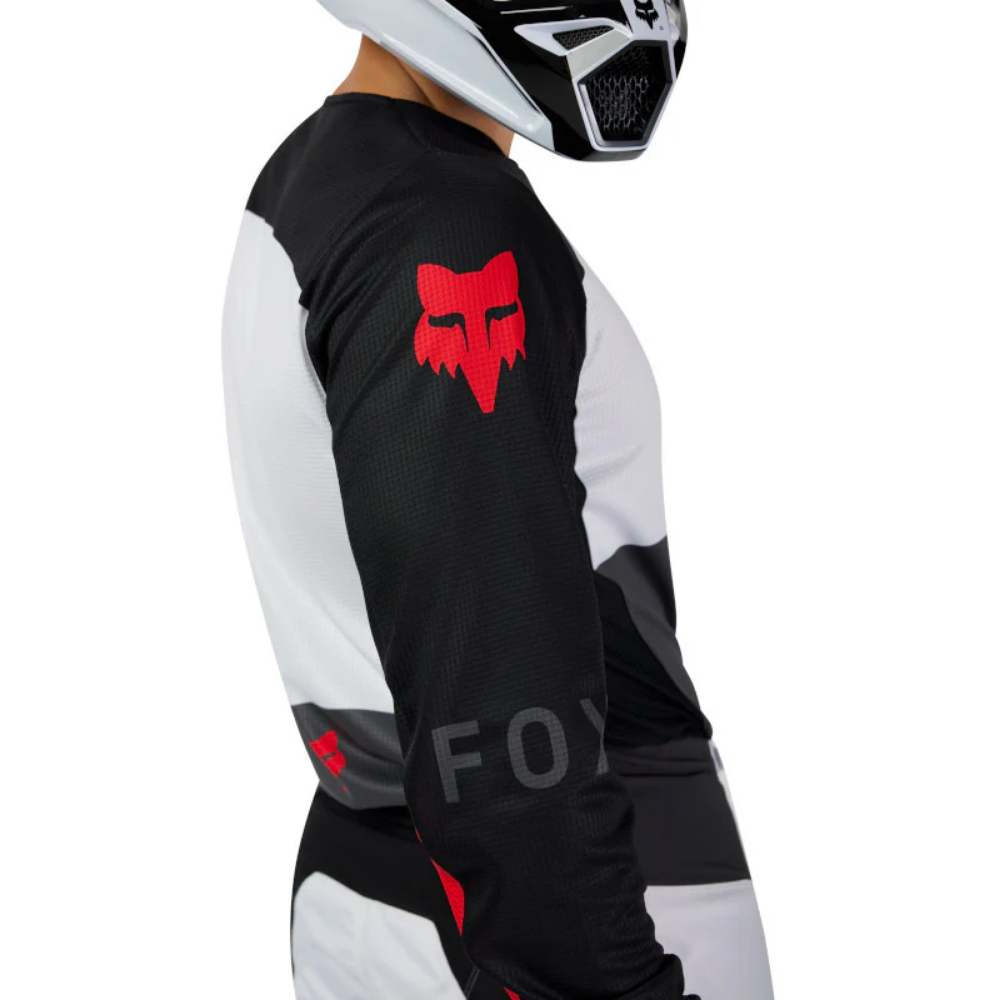 UNIFORME FOX 180 FLOW [BLANCO/ ROJO]
